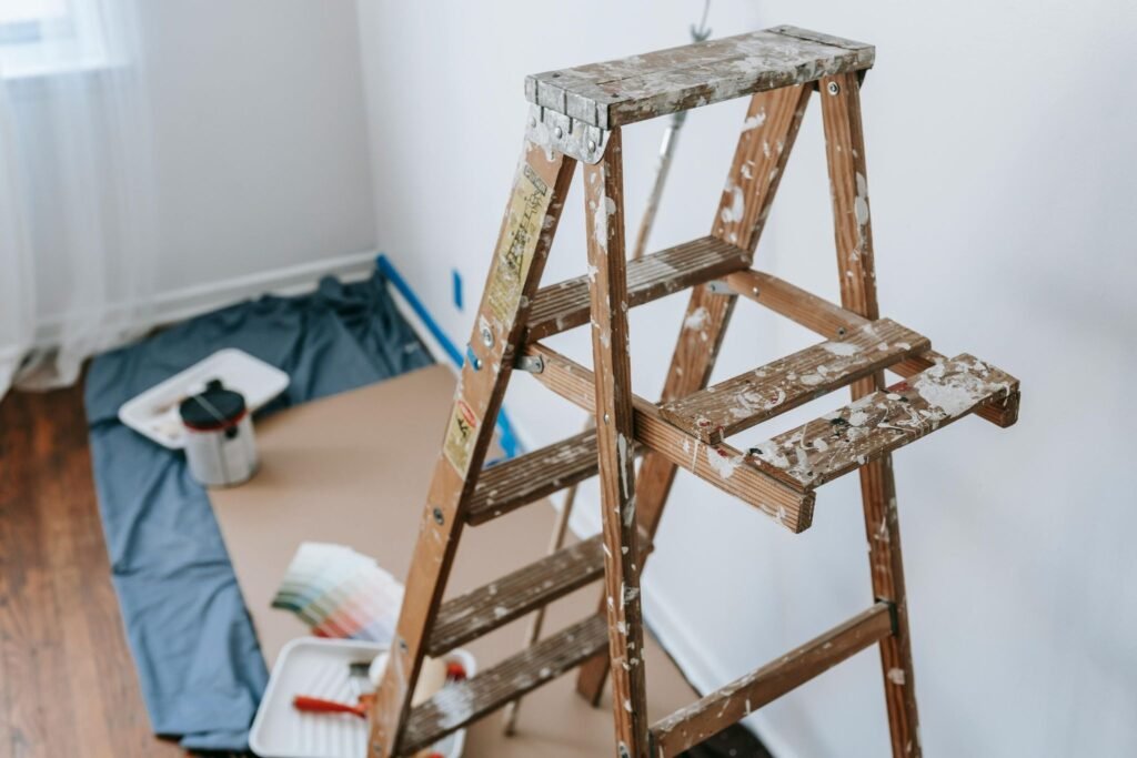 Ladder in house with paint on it